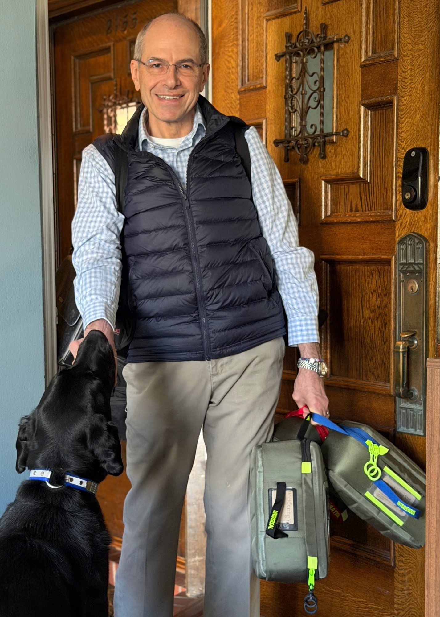 Dr. Behrens arriving at a client's home with his equipment